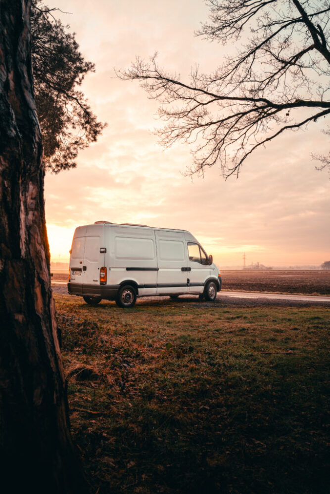 White camper van in sunrise